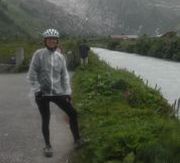 Becky stands beside the headwater of the Rhone River